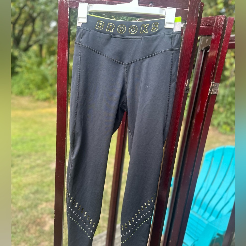 Brooks womens Charcoal Leggings with Gold Accents
